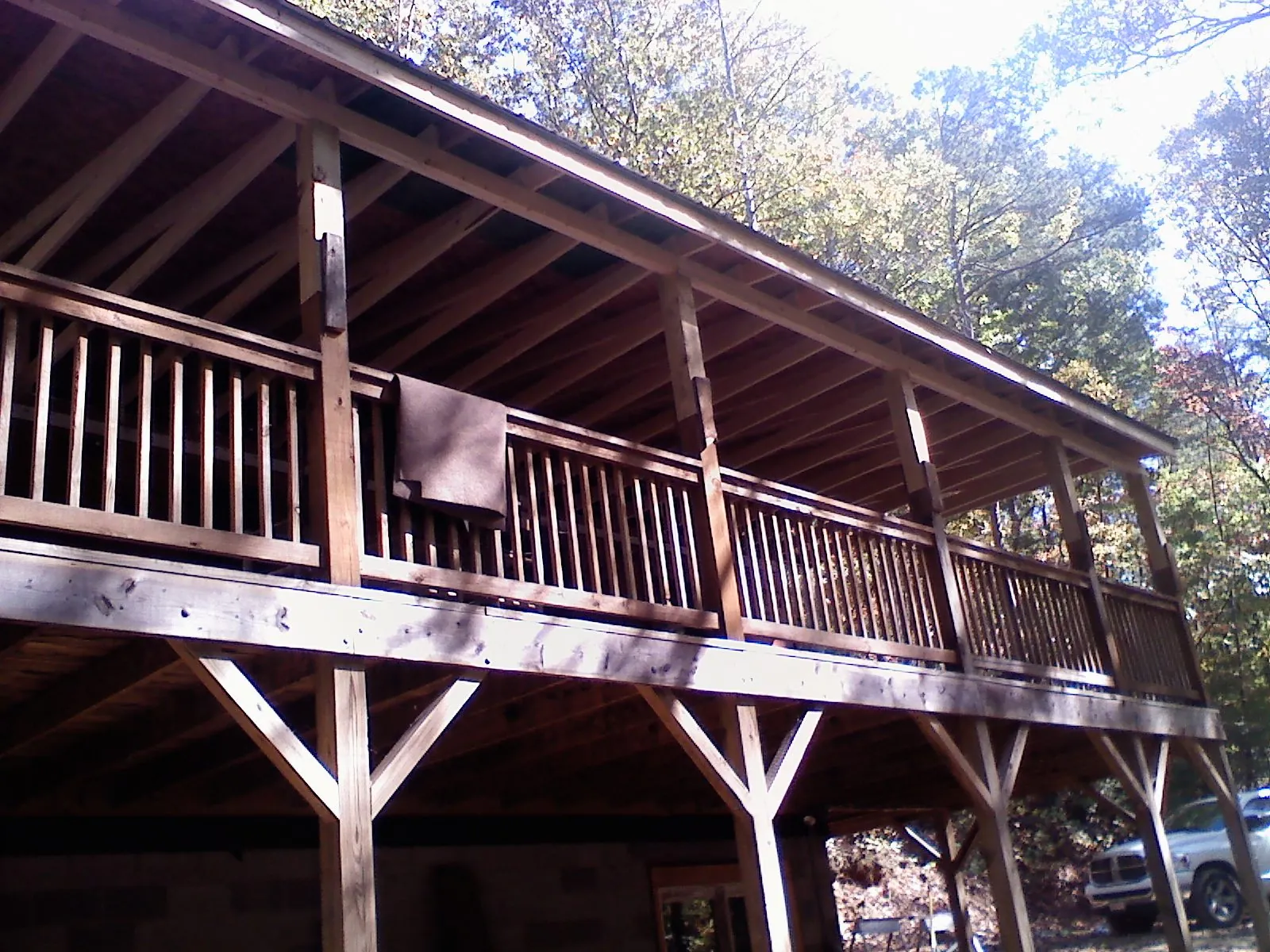 Timber framing under a new elevated porch and deck — Roof Leak Repair in Lisbon by Roofing Brothers